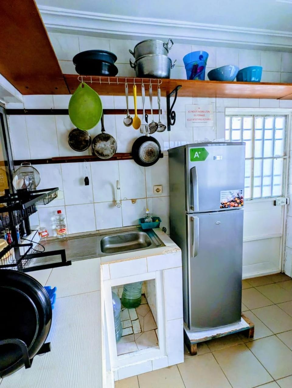 Kitchen or kitchenette, dishwasher, oven, stove