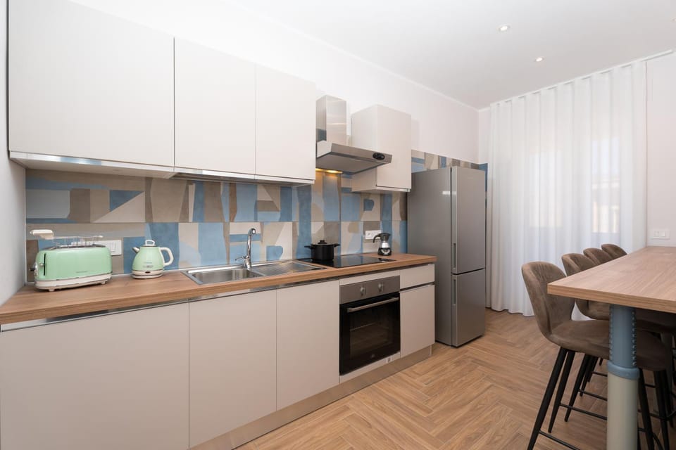 Kitchen or kitchenette, Dining area, oven, stove, toaster