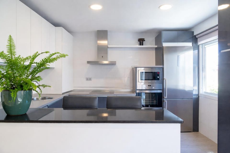 Kitchen or kitchenette, stove, kitchen