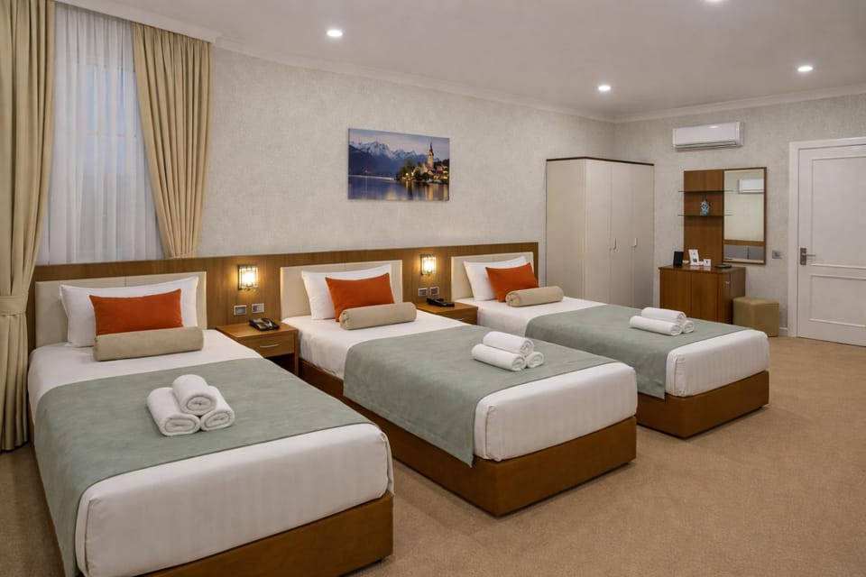Bed, Photo of the whole room, Bedroom, towels, air conditioner