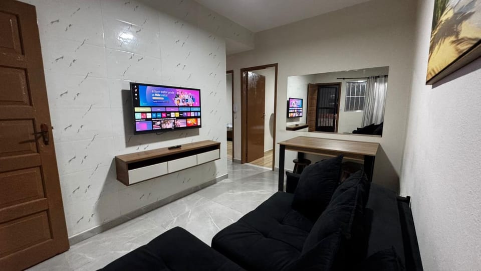 Apt Boqueirão 2min da praia com garagem e wifi Apartment in State of São Paulo