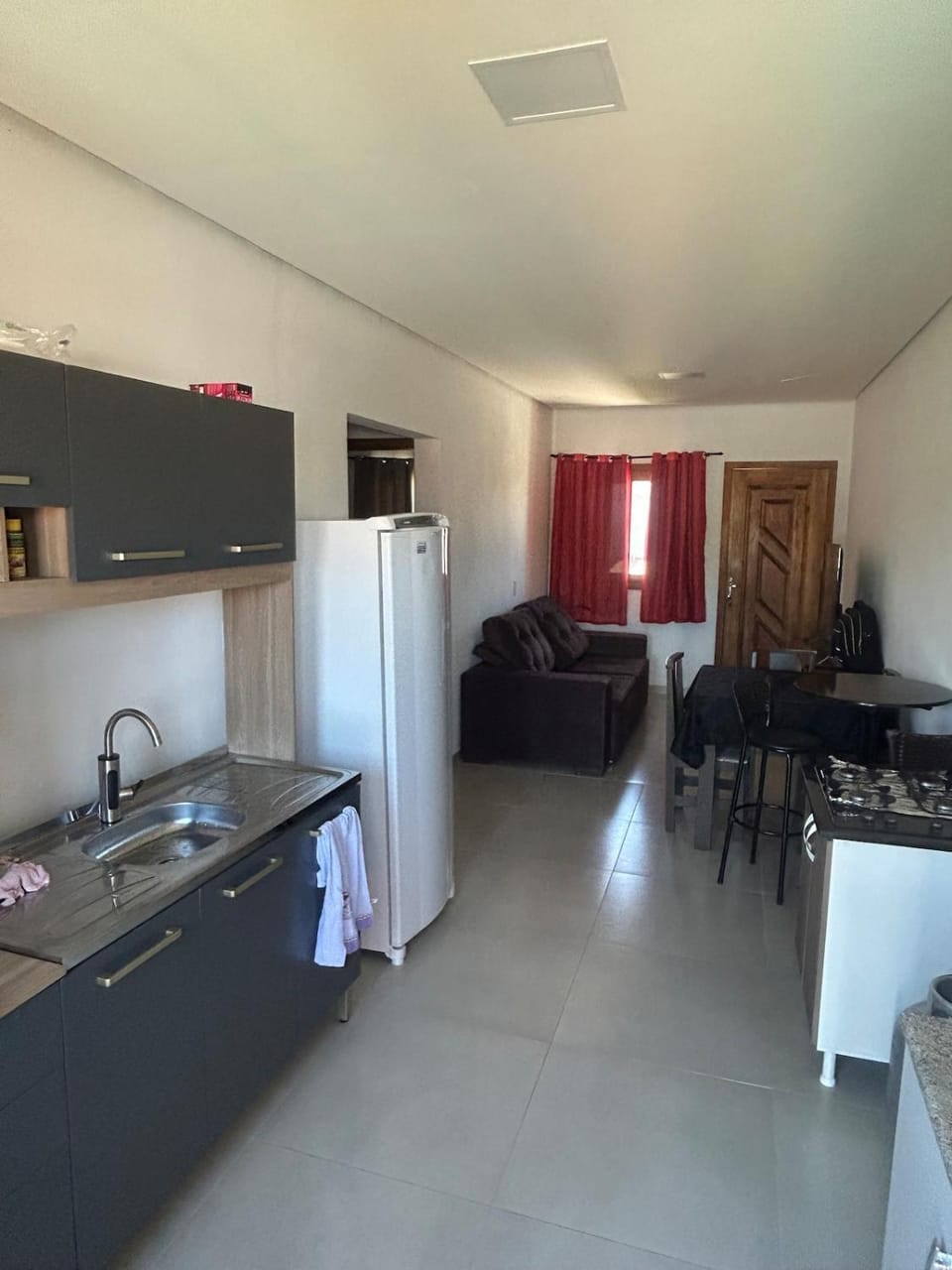 Kitchen or kitchenette, Living room, stove
