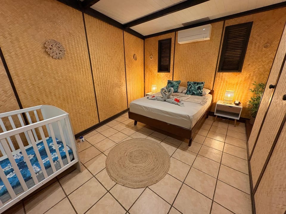 Photo of the whole room, Bedroom, cot, towels