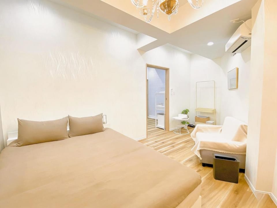 Photo of the whole room, Bedroom, towels, air conditioner