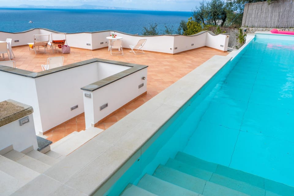Patio, Day, Natural landscape, Pool view, Sea view, Swimming pool, sunbed