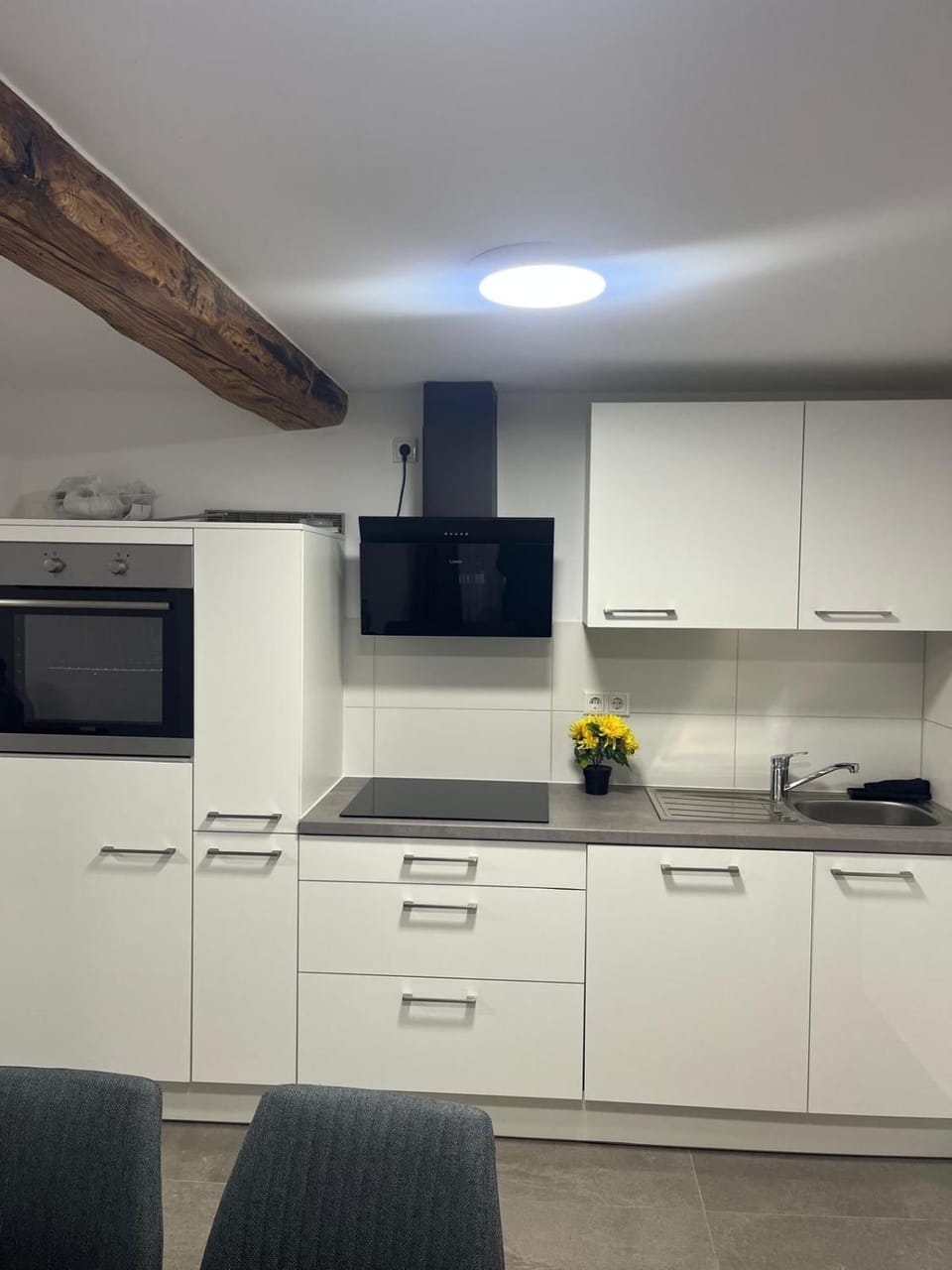Kitchen or kitchenette, oven, stove