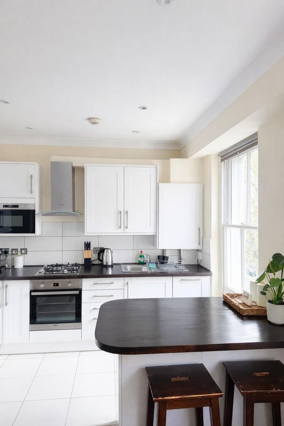 Kitchen or kitchenette, Dining area, dishwasher, stove, toaster