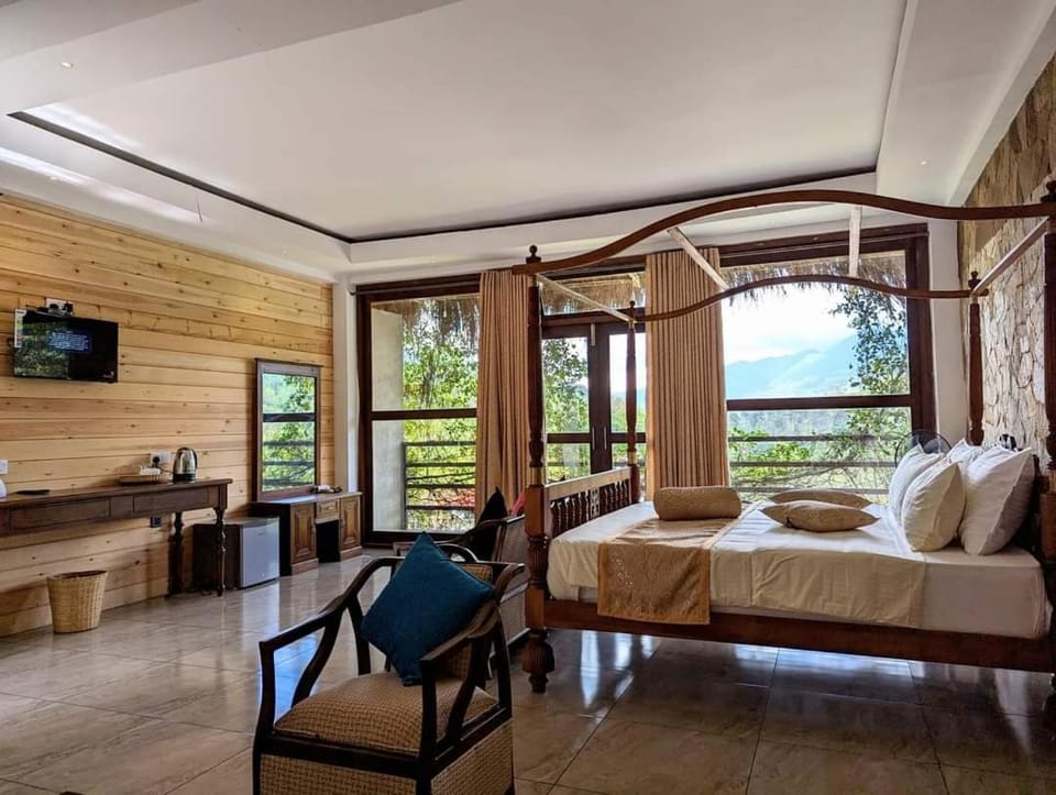 Bed, TV and multimedia, Living room, Seating area, Bedroom