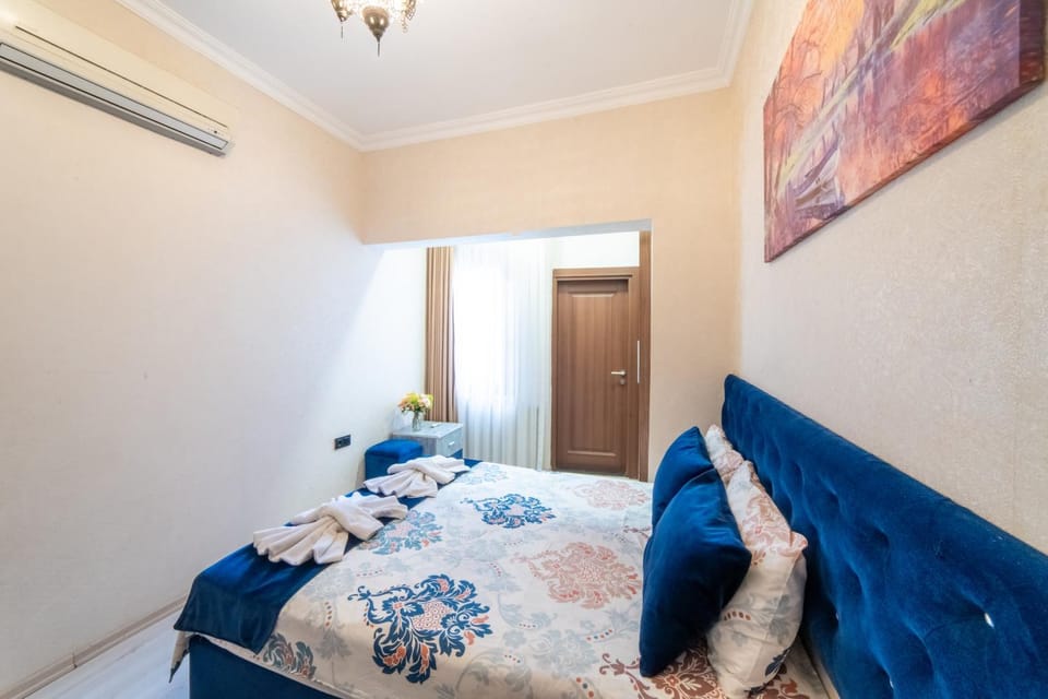 Photo of the whole room, Bedroom, towels, air conditioner