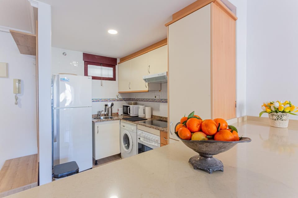 Kitchen or kitchenette, oven, stove