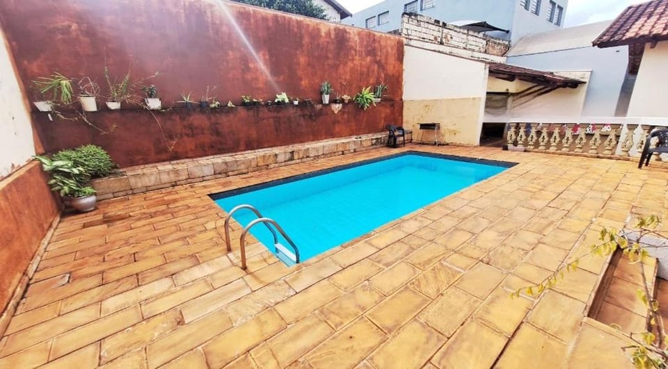 Property building, Patio, Day, Pool view, Swimming pool