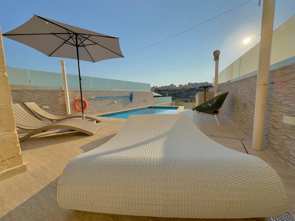 Patio, Day, Balcony/Terrace, Pool view, Swimming pool, sunbed