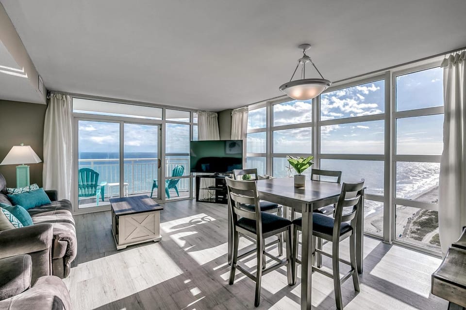 Natural landscape, TV and multimedia, Living room, Seating area, Dining area, Beach, Sea view