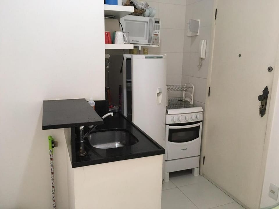 Kitchen or kitchenette, microwave, oven, stove, toaster