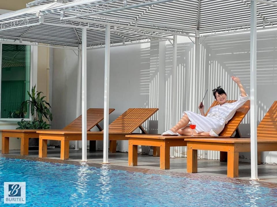 Swimming pool, sunbed
