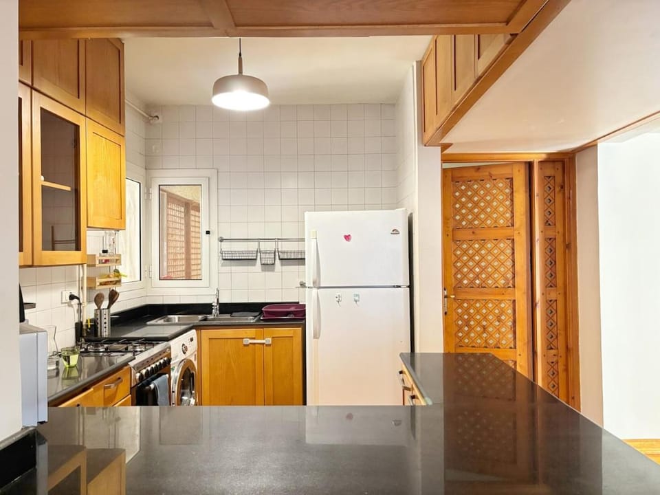 2BR Helm Warm Wooden Charm-Prime Location Apartment Apartment in Cairo Governorate