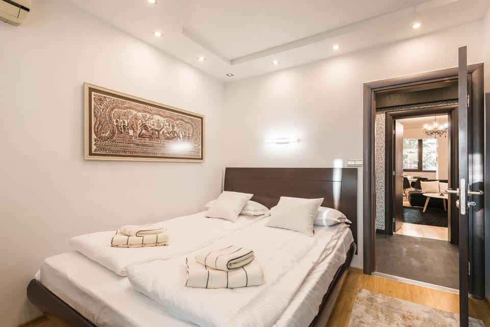 Bed, Photo of the whole room, Bedroom, towels, air conditioner
