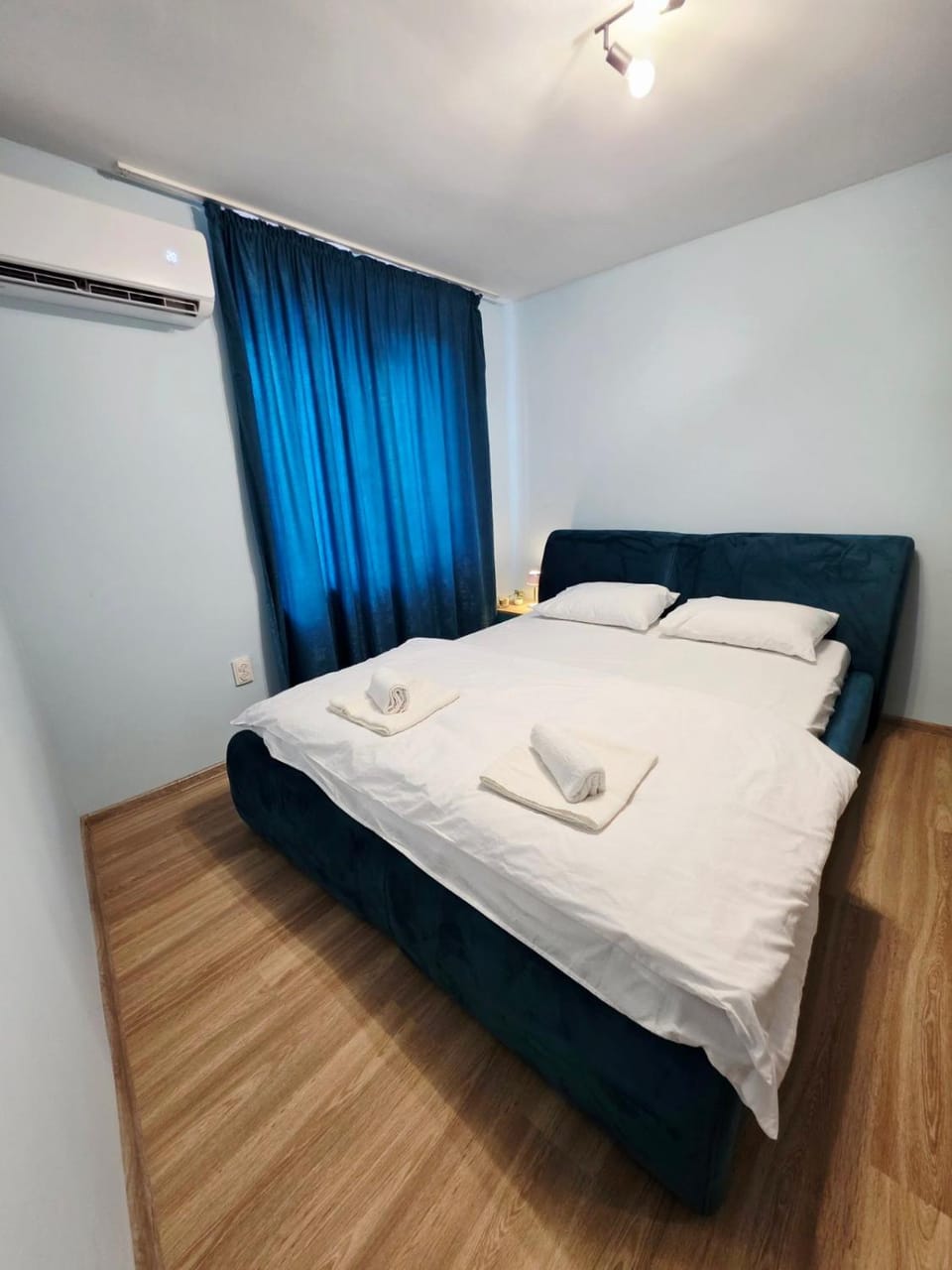 Bed, Photo of the whole room, Bedroom, towels, air conditioner