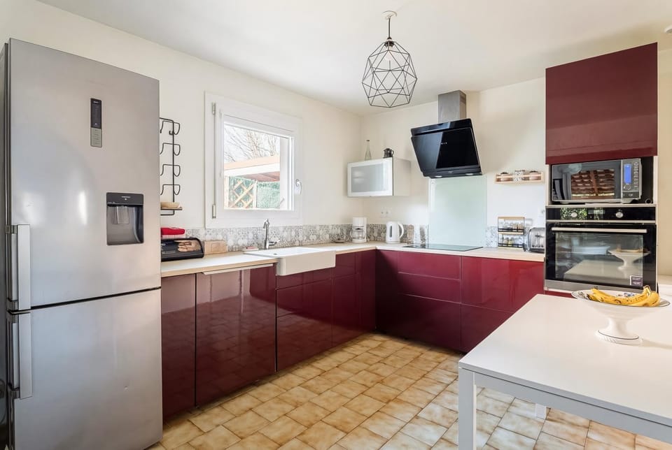 Kitchen or kitchenette, dishwasher, oven, stove, toaster