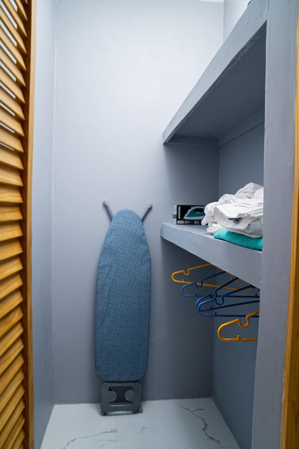 flat iron, towels, wardrobe