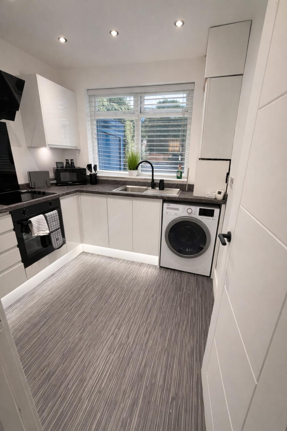 Kitchen or kitchenette, oven, stove, toaster