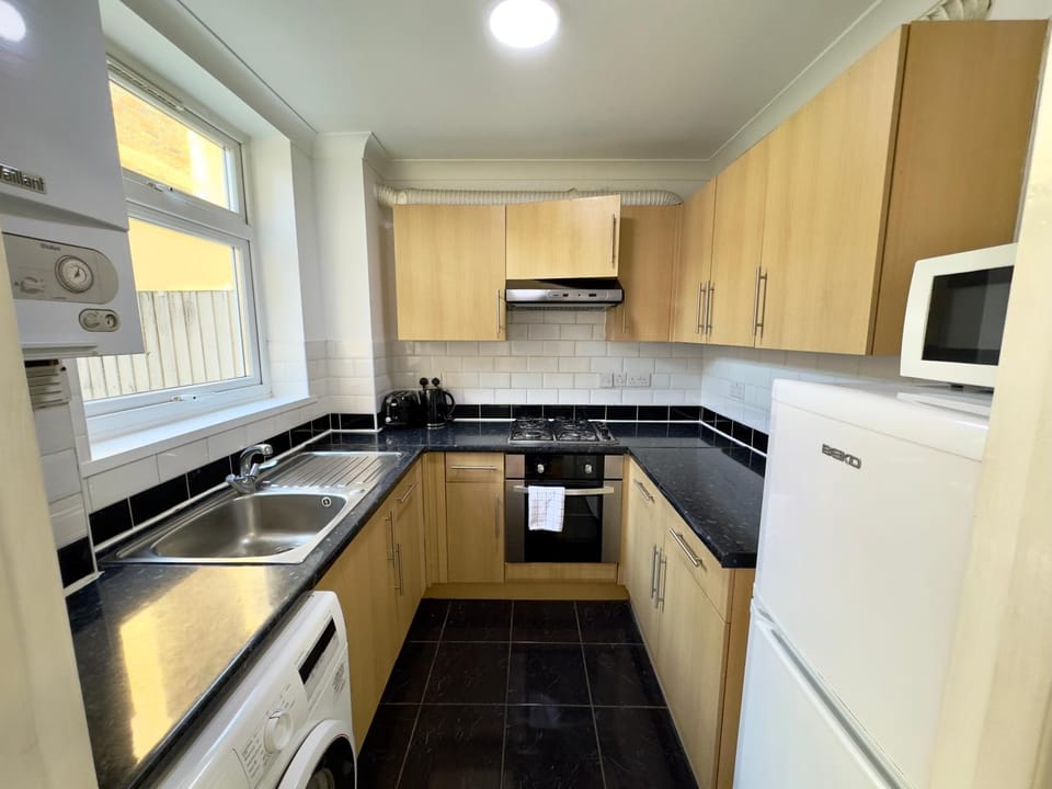 Kitchen or kitchenette, oven, stove, toaster