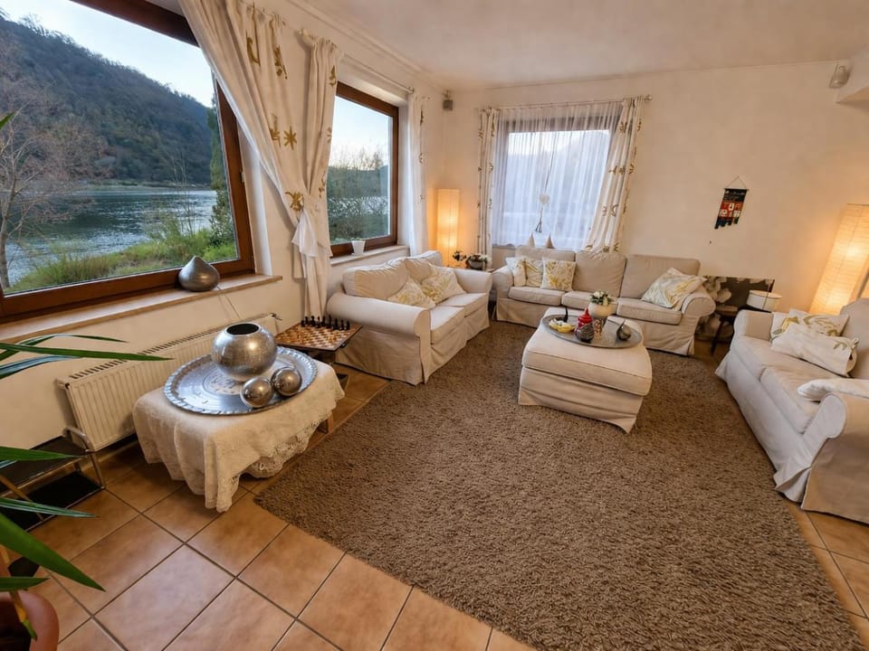 Natural landscape, Living room, Lounge or bar, Seating area, River view
