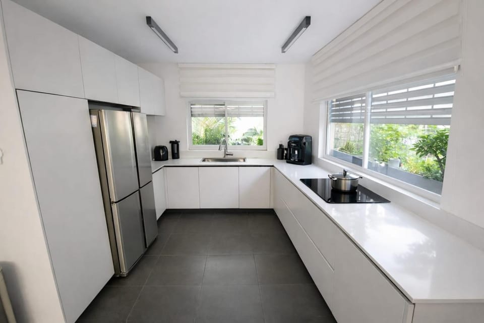 Kitchen or kitchenette, dishwasher, oven, stove