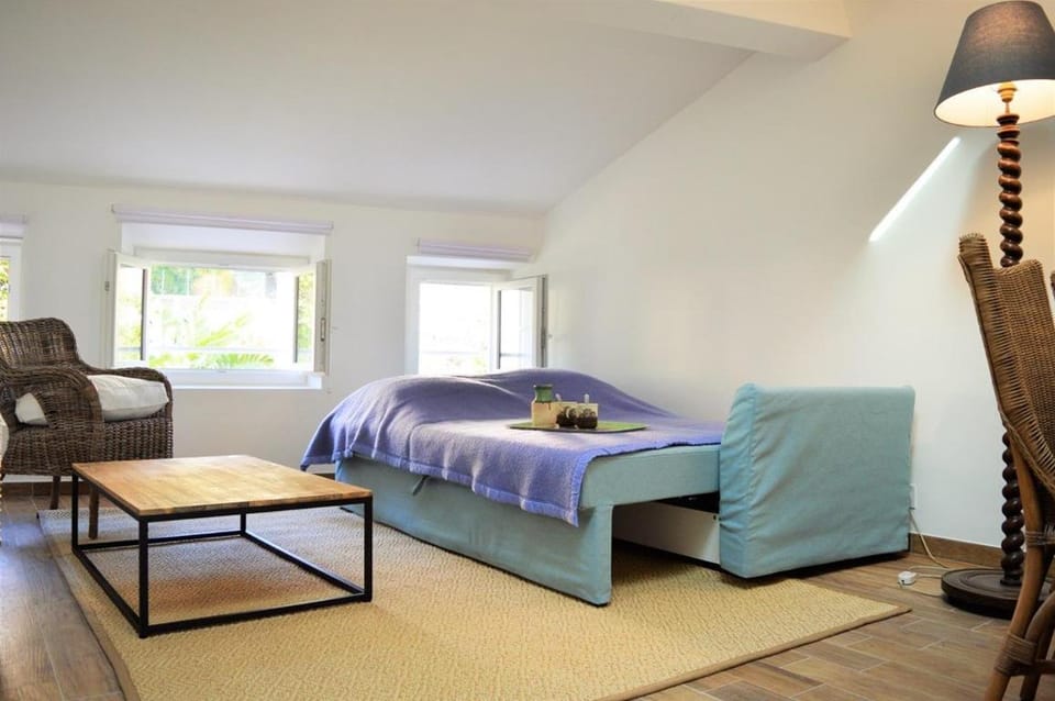 Bed, Living room, Seating area