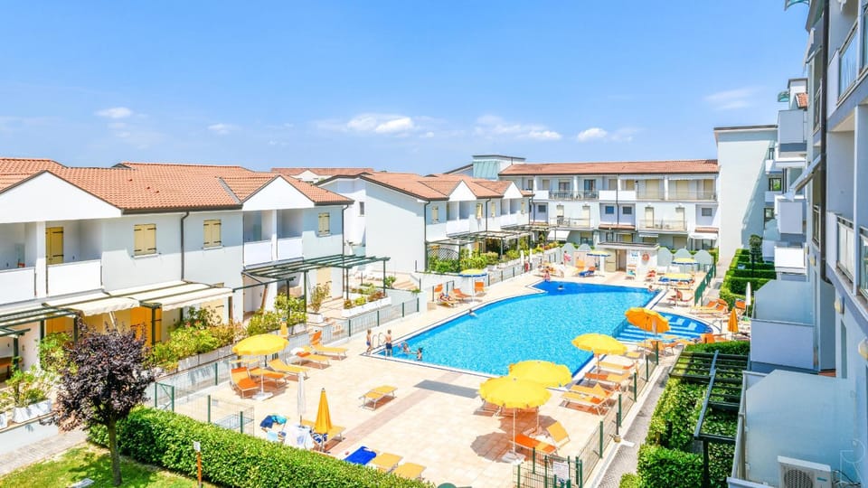 Property building, Pool view, Swimming pool, sunbed