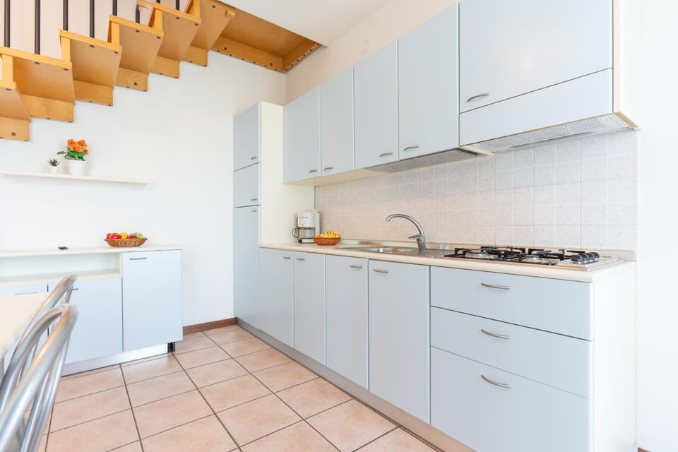 Kitchen or kitchenette, stove