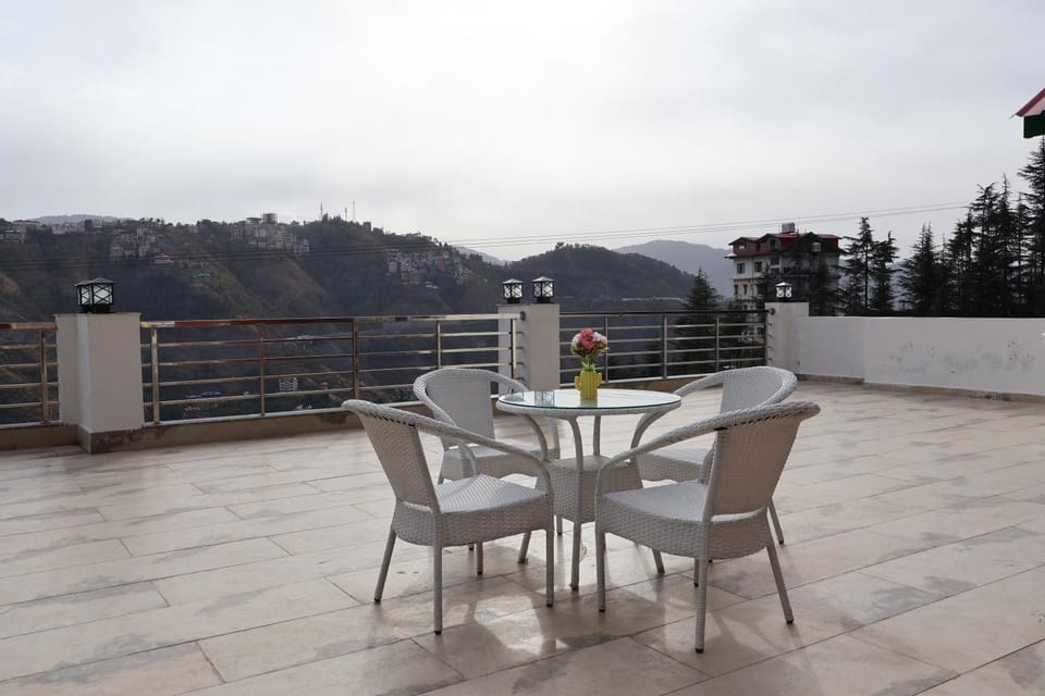 View (from property/room), Balcony/Terrace, Seating area, Dining area, Mountain view