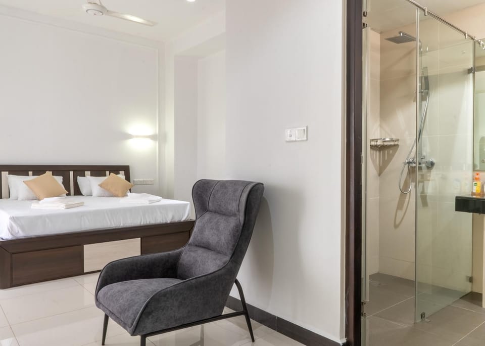 Bed, Bathroom, Seating area, Bedroom