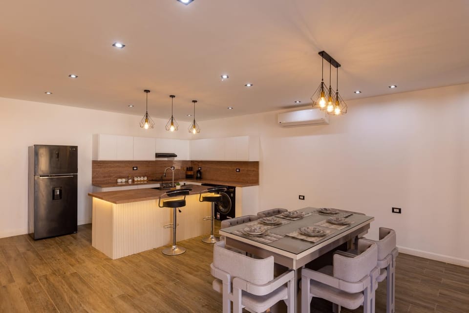 Dining area, dishwasher, oven, stove
