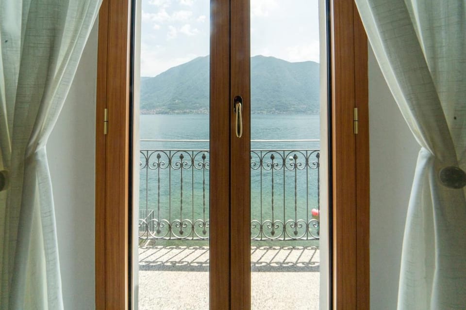 Lakefront Home with Private Beach Garage and AC Apartment in Tremezzina