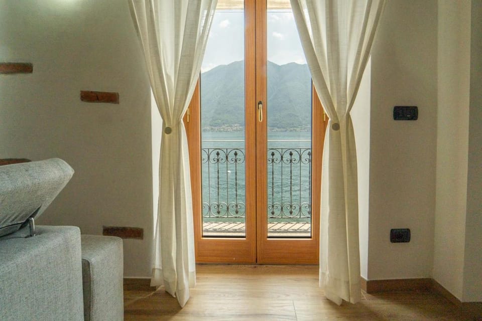 Lakefront Home with Private Beach Garage and AC Apartment in Tremezzina