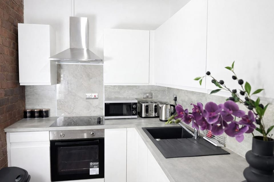 Kitchen or kitchenette, oven, stove, toaster