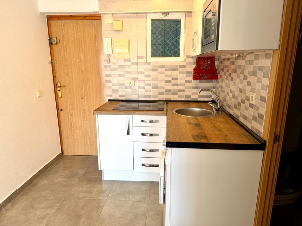 Kitchen or kitchenette, stove