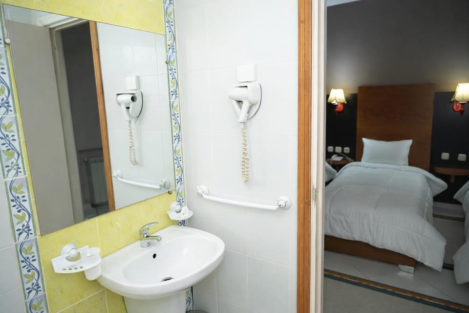 Bed, Bathroom, Bedroom, hair dryier