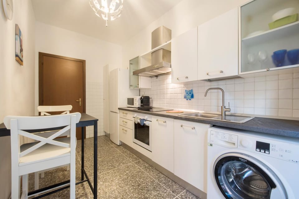 Kitchen or kitchenette, Dining area, dishwasher, oven, stove, washing machine