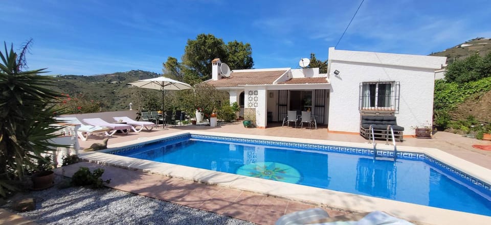 Property building, Living room, Swimming pool