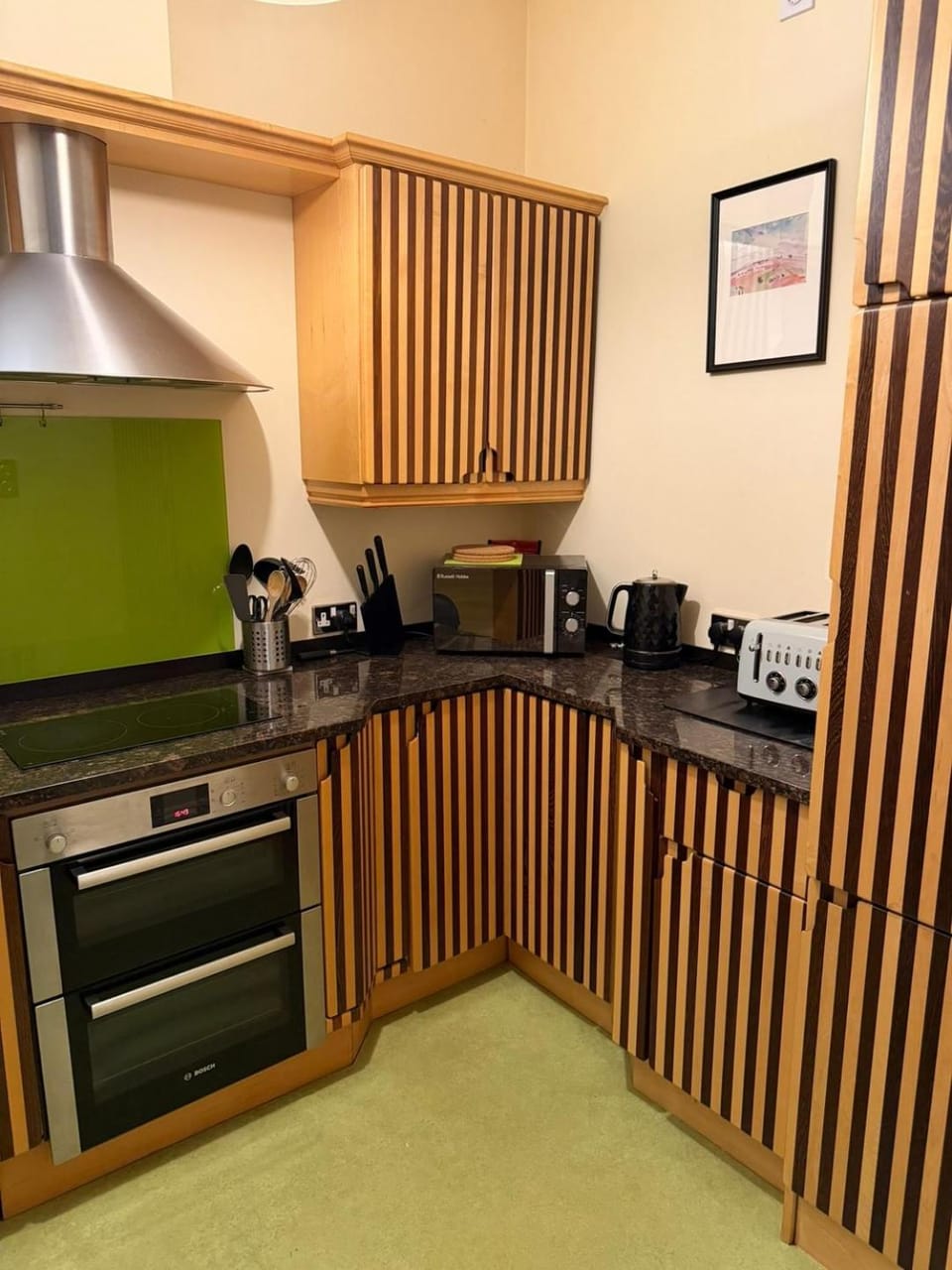 Kitchen or kitchenette, microwave, oven, stove, toaster