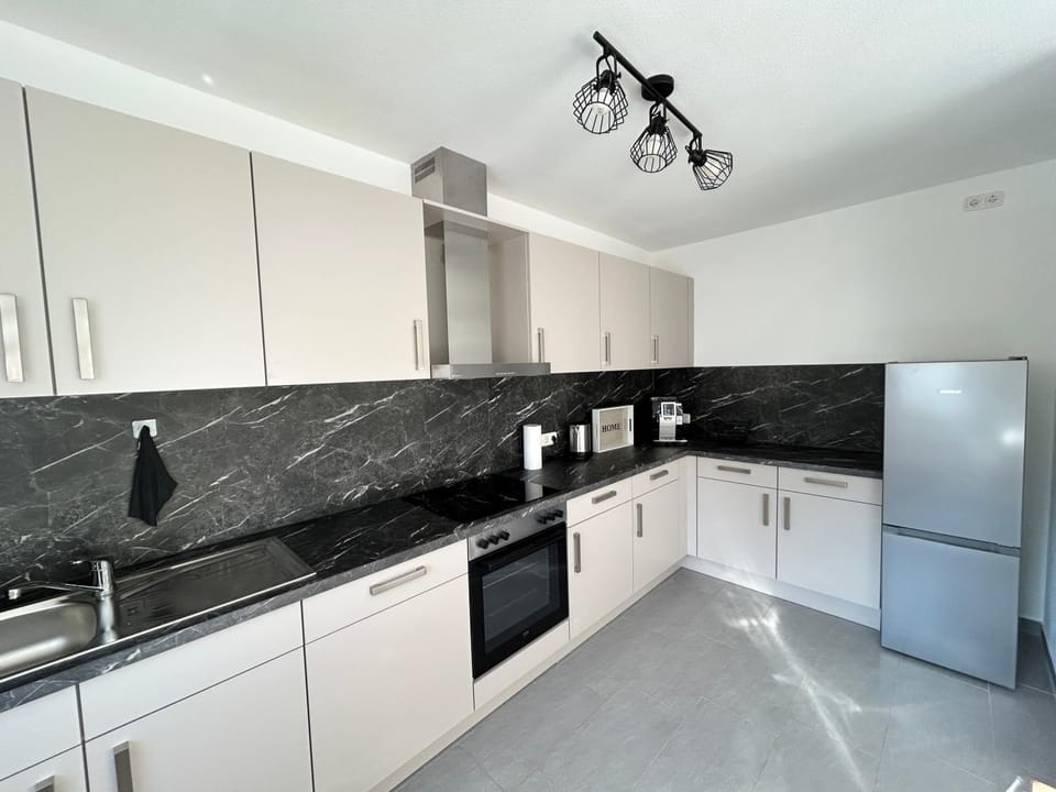 Kitchen or kitchenette, oven, stove