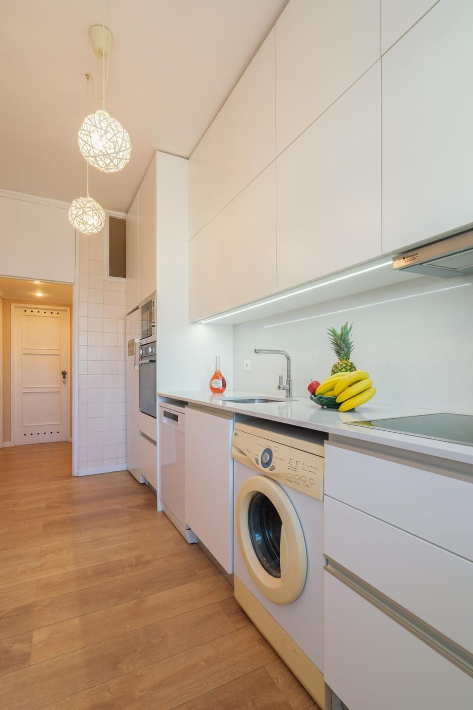 Kitchen or kitchenette, washing machine