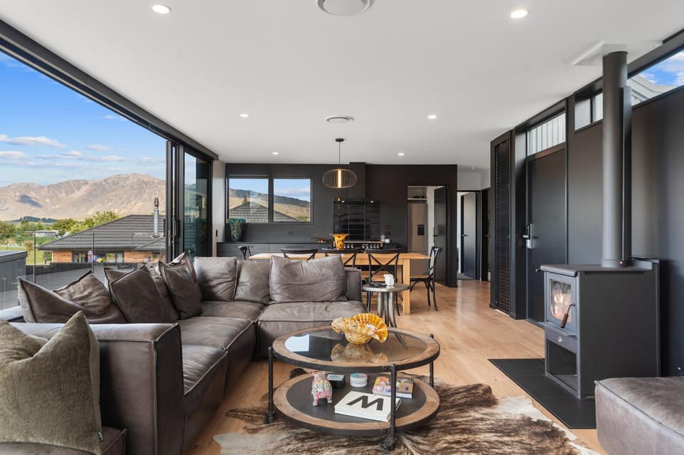 Natural landscape, Living room, Seating area, Dining area, Mountain view, fireplace