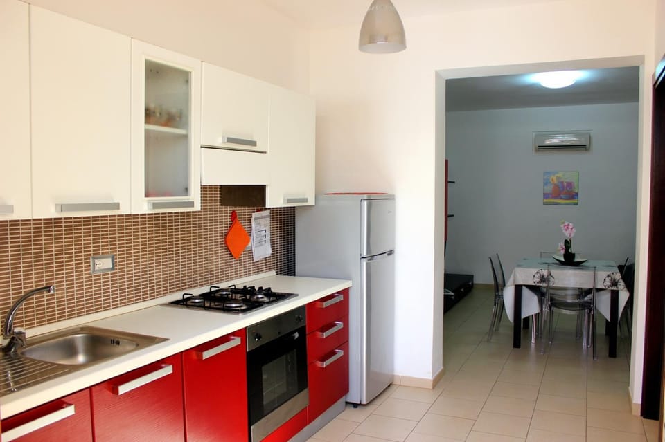 Kitchen or kitchenette, oven, stove