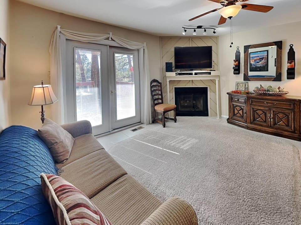 TV and multimedia, Living room, Seating area, fireplace, furniture