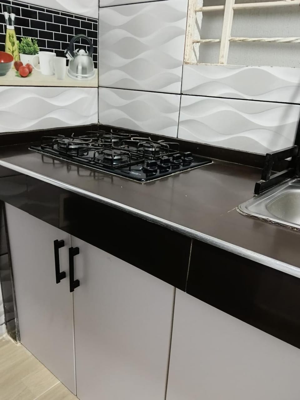 Kitchen or kitchenette, stove