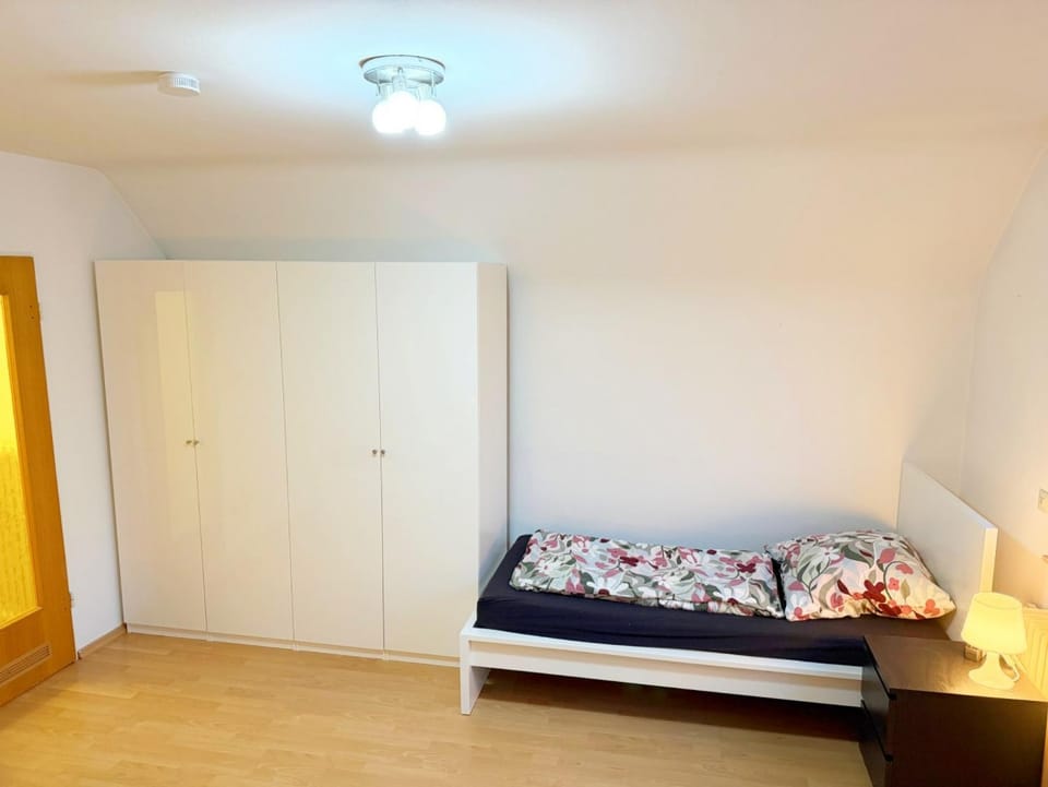 Bed, wardrobe