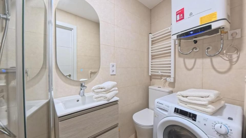 Shower, Bathroom, towels, washing machine, dryer